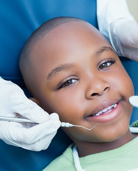 young boy visiting children’s dentist in Collegeville